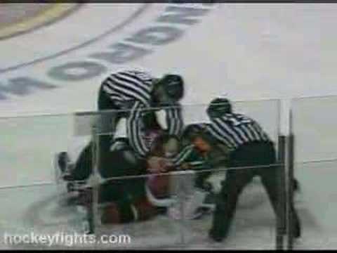 D. Boogaard (MIN) vs. E. Godard (CGY)