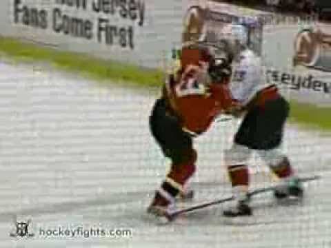 K. Oliwa (CGY) vs. G. Marshall (NJD)