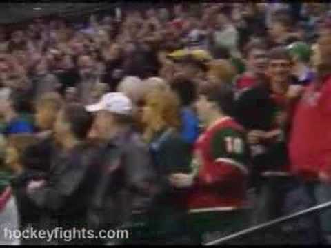 E. Godard (CGY) vs. D. Boogaard (MIN)