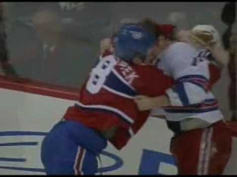B. Dubinsky (NYR) vs. M. Komisarek (MTL)